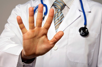 Болит спина внизу справа что это